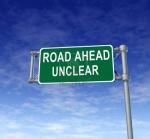 11405182-road-ahead-unclear-green-freeway-sign-representing-uncertainty-in-financial-business.jpg