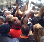 Praying On Wall Street Bull